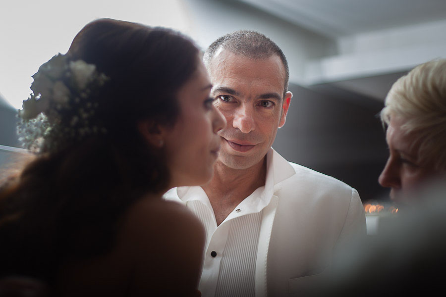 Groom looking at the bride