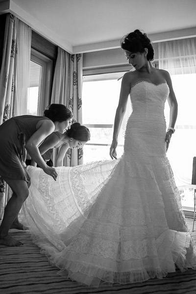 Friends helping bride