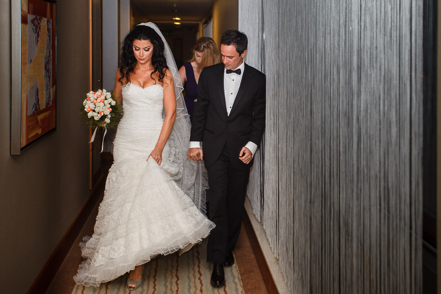 Bride and groom walking to the reception area