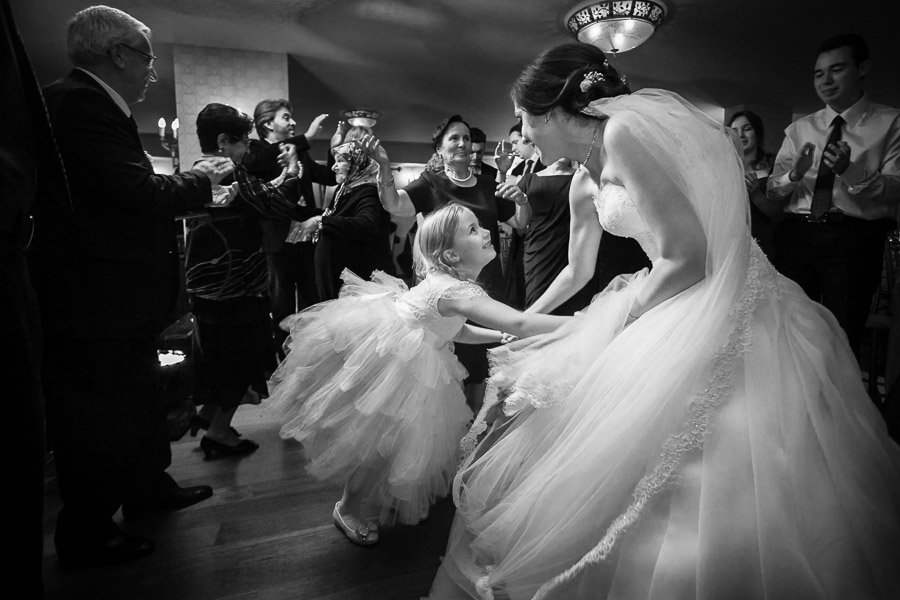 bride dancing with little girl at bosphorus palace wedding