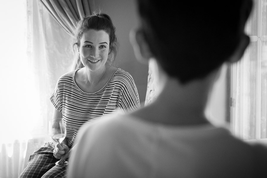 Sister watches bride makeup at Casa Lavanda wedding