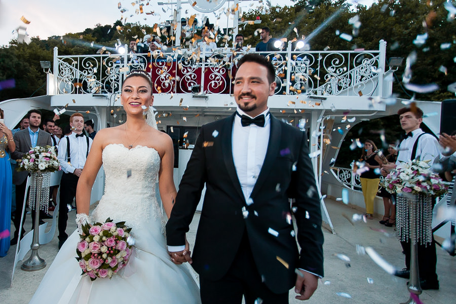 Confetti for bride and groom in boat wedding on bosphorus 