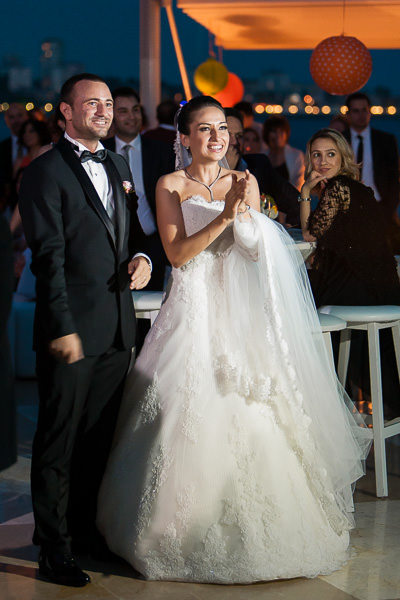 Bride and groom watch slideshow at Moda Deniz Kulubu wedding