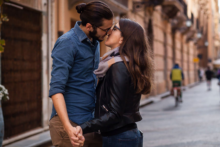 romantic couple on streets of trapani italy