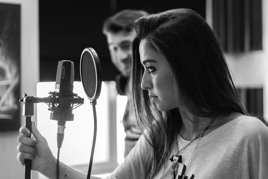 bride to be on microphone in studio