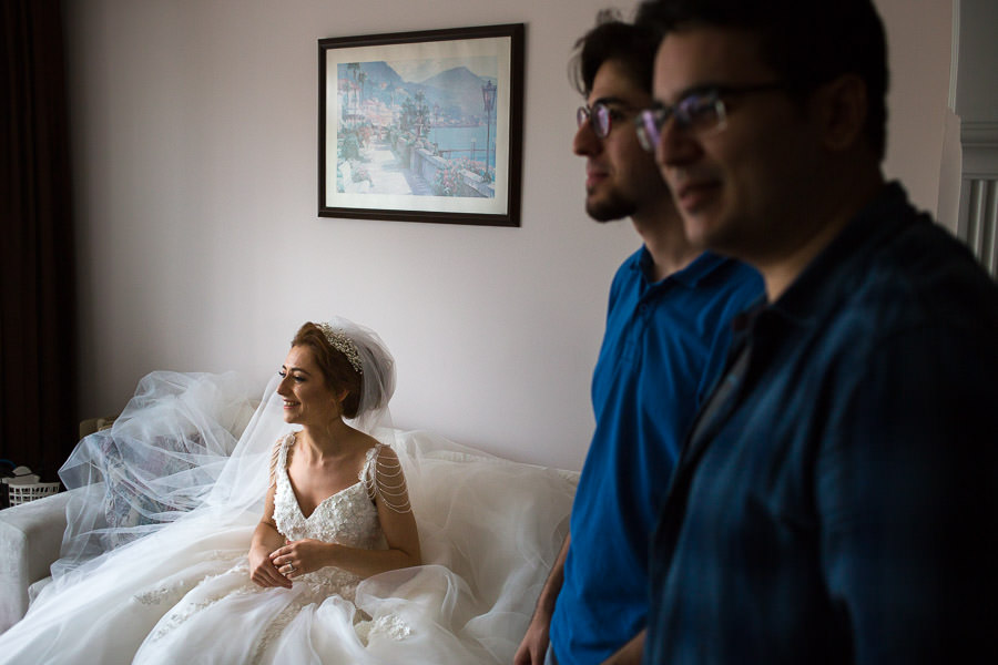 Bride sitting on couch while friends visiting