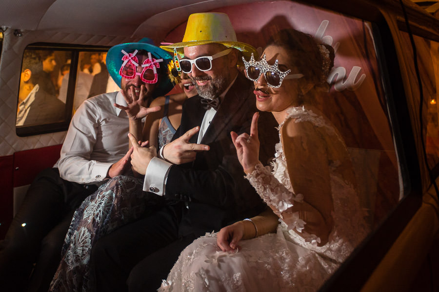 bride groom in photobooth with friends