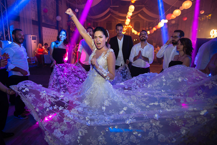 bride having fun at beykoz shoe factory wedding