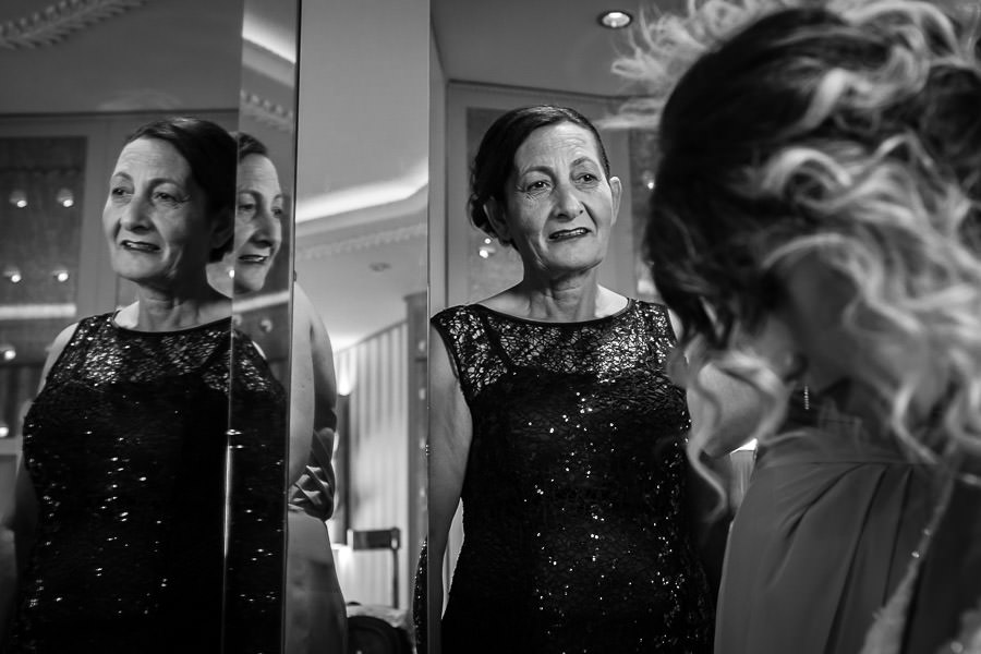 bride's mother checking the preparations