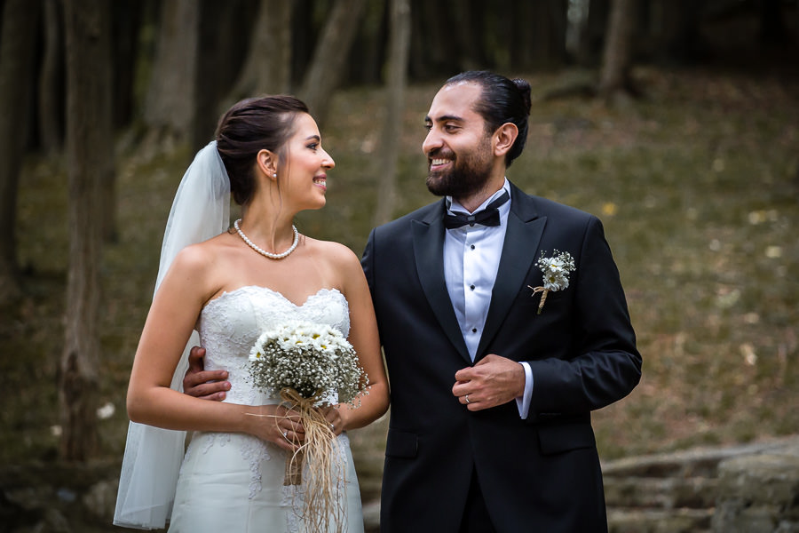 bride and groom facing each other